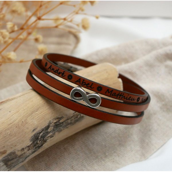 L&aelig;derrem med flere drejninger, der kan tilpasses, med stjerne-, infinity- eller hjertemotiv 