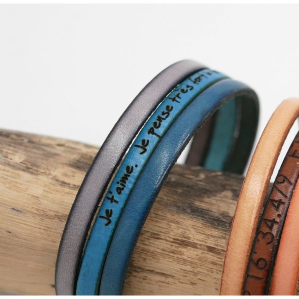 L&aelig;der trio manchetarmb&aring;nd til personlig tilpasning 